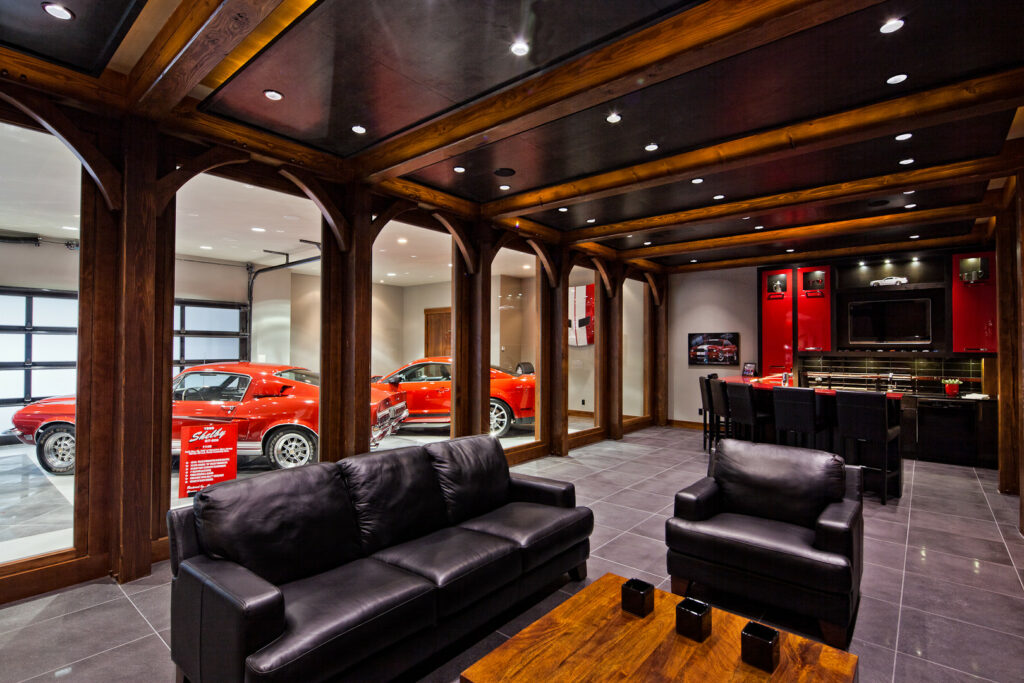 Luxurious garage in a custom-designed home with ample space for cars, workshop, and entertainment.